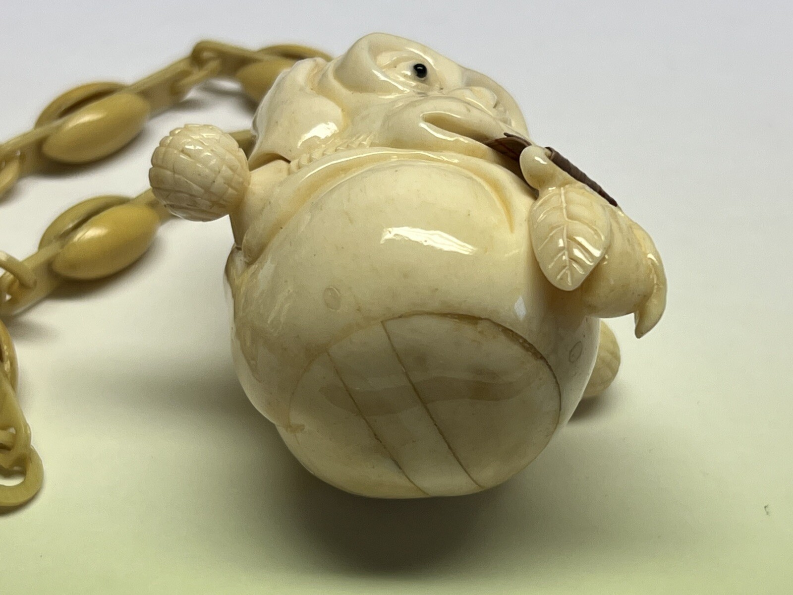 ANTIQUE ART DECO MONKEY NECKLACE TAPE MEASURE CELLULOID CHAIN PENDANT WHIMSICAL