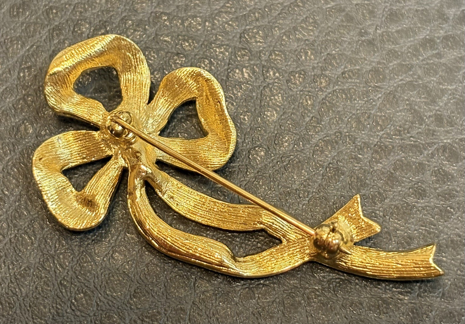 Vintage 80s Runway Gold Tone Rhinestone Black Enamel Ribbon Bow Brooch Pin