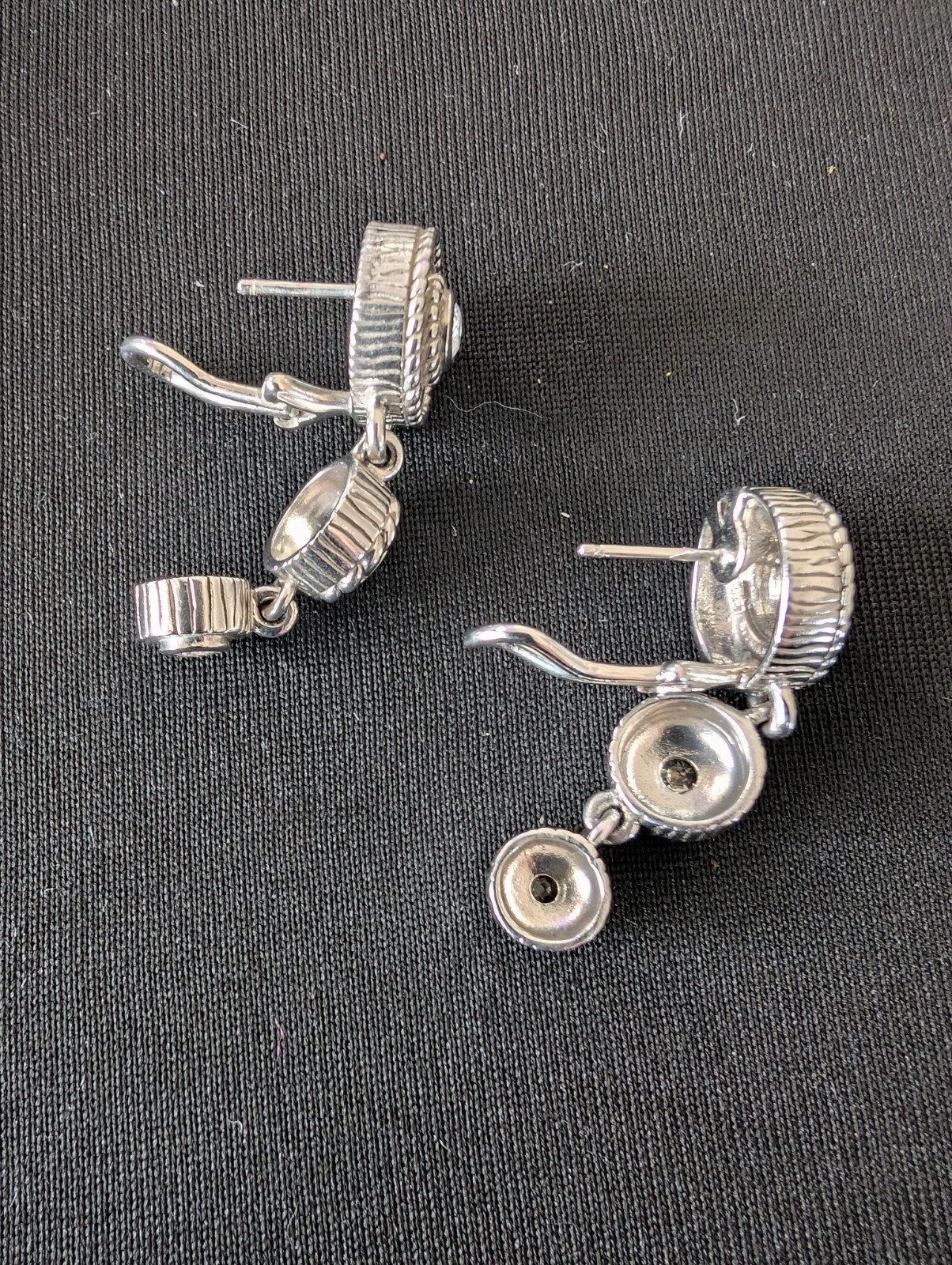 JUDITH RIPKA 925 Silver Twist Dangle Earrings