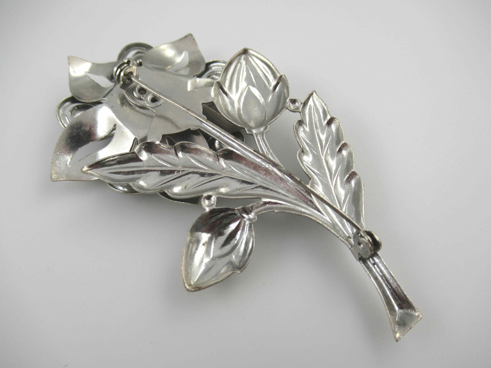 Vintage Purple/Blue Rhinestone on Silver Tone Stamped Metal Flower Brooch, Pin