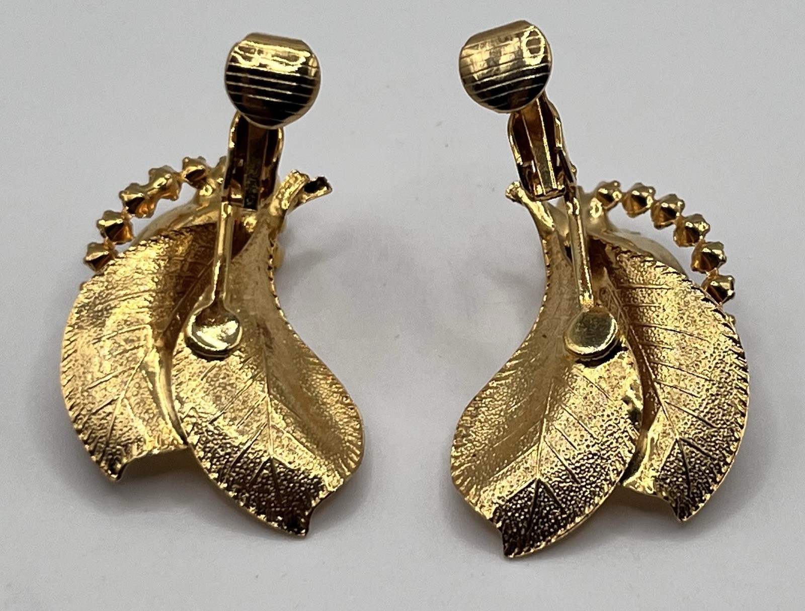Vintage Rhinestone Clip On Earrings Gold Tone Leaf Vibrant Red And Clear Stones