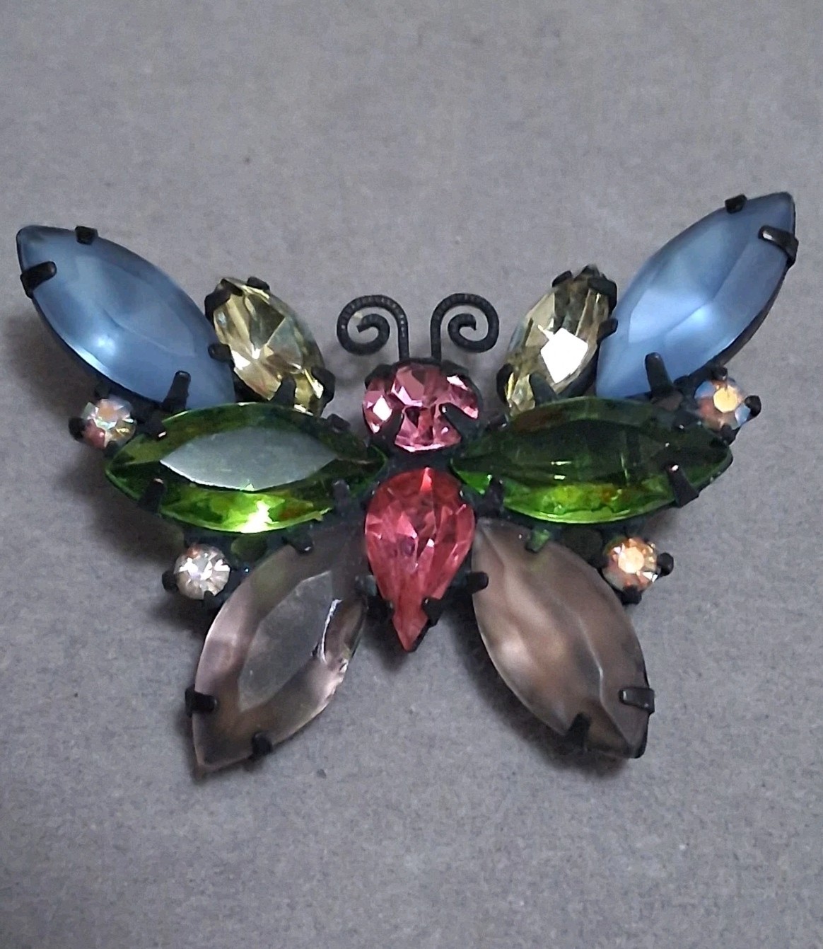 Vintage Juliana butterfly brooch multi color & shape prong set stones