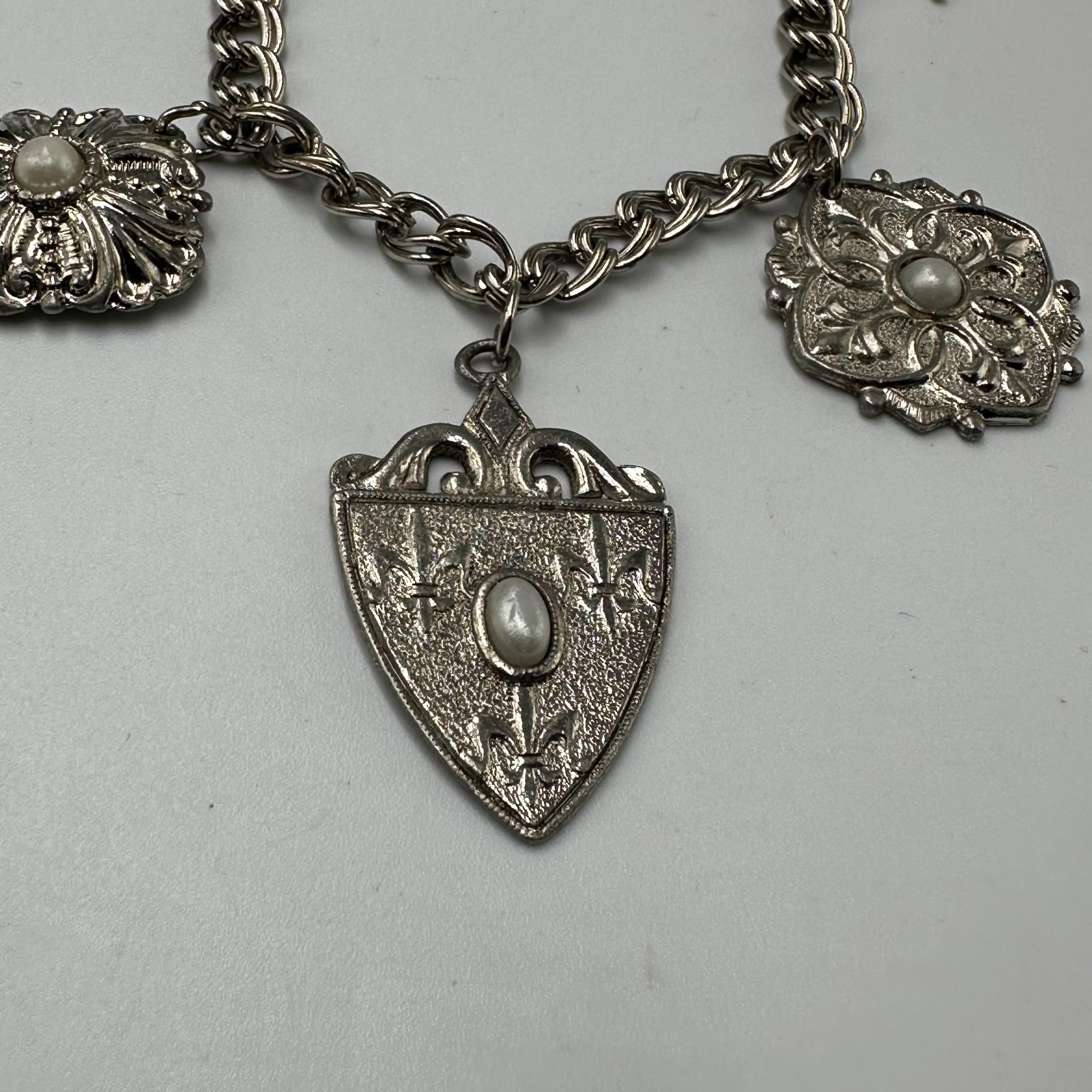 Vintage Charm Bracelet Silver Tone Filigree Embossed Faux Pearl Dangle Shields