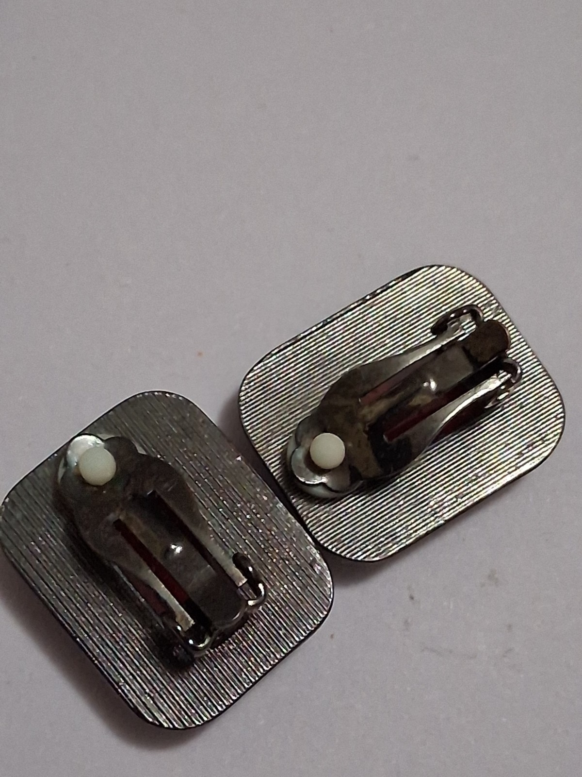Red faceted acrylic rectangle clip on halo earrings, clear rhinestone border