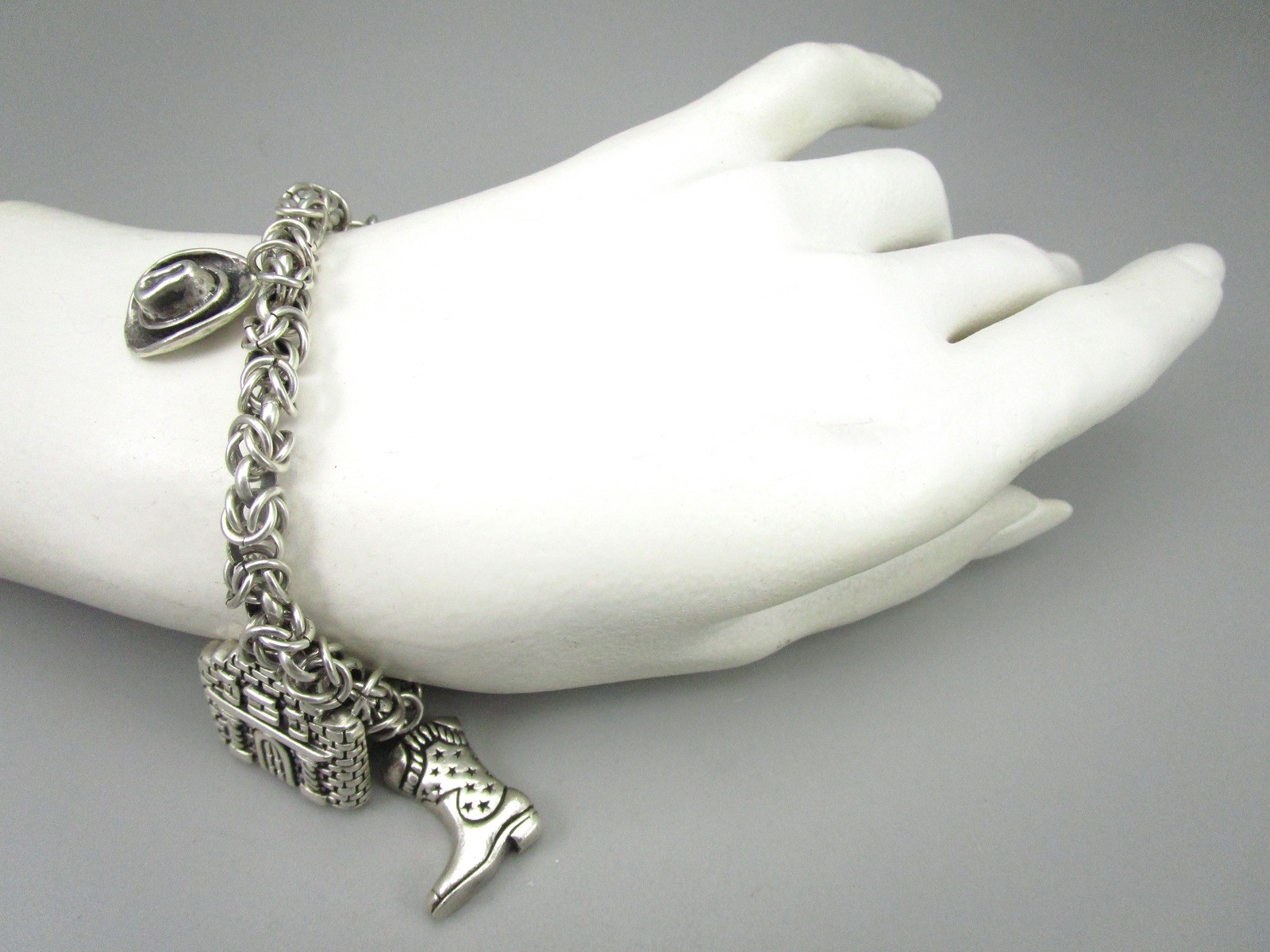 SCARCE DIAN MALOUF STERLING SILVER TEXAS THEME CHARM BRACELET 60 GRAMS