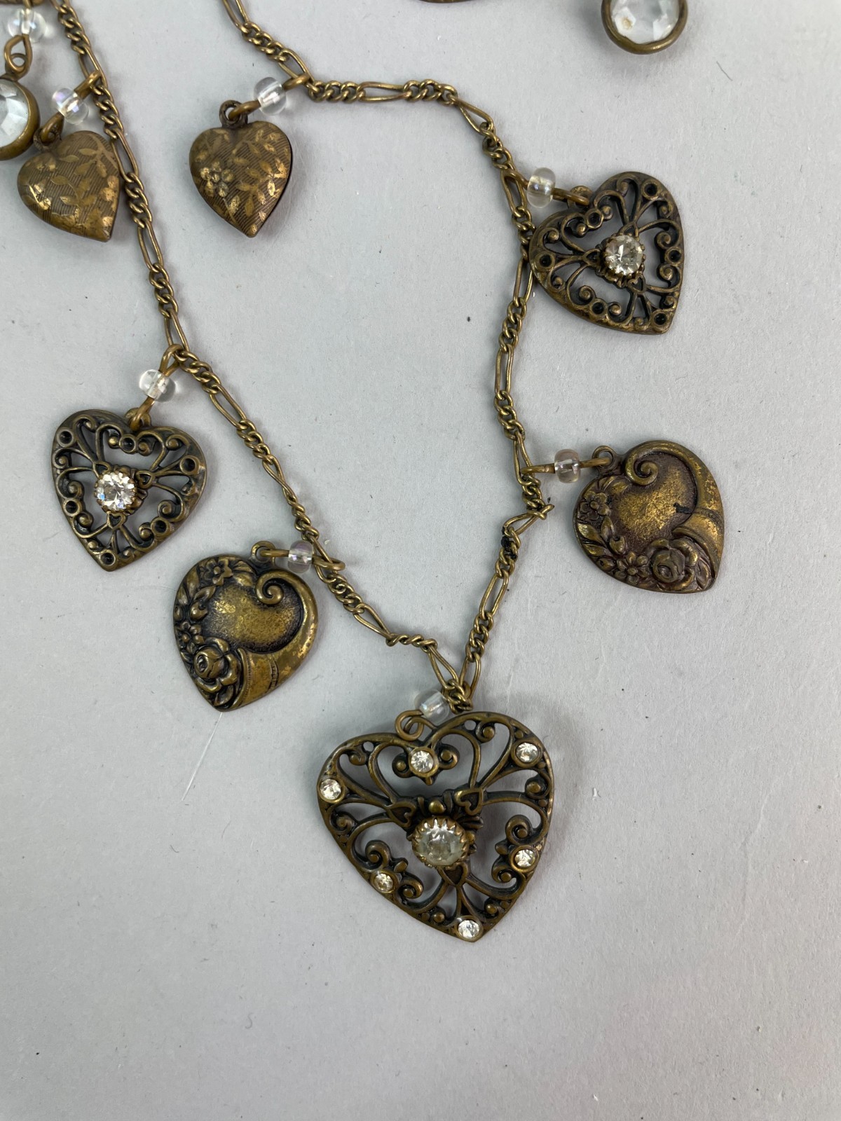VTG 90s GLASS WORKS STUDIO Brass BOHO Heart charms Necklace 64″
