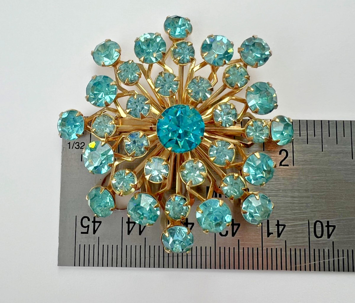 Vintage 1960s Aqua Blue Rhinestone Starburst Brooch Gold Tone Unworn Pin 2″