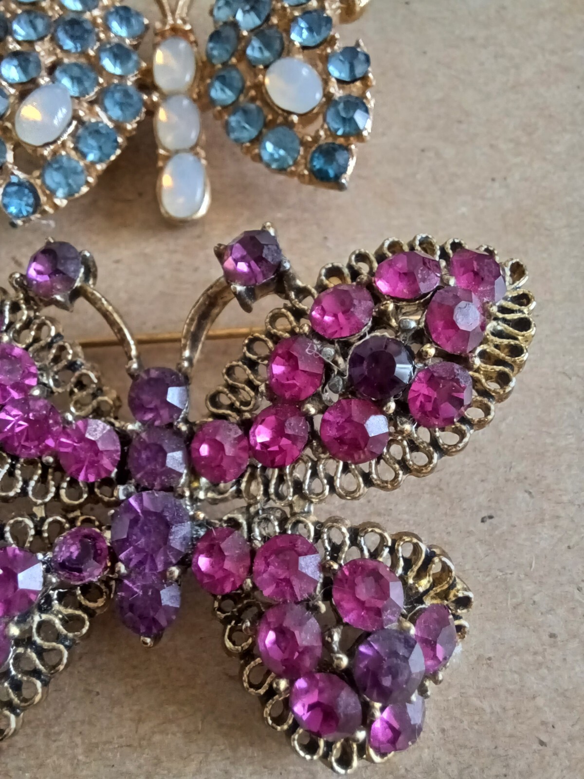 Vintage Lot Of 2 Rhinestone Butterfly Pins Brooches Pink Purple And Blue Milky