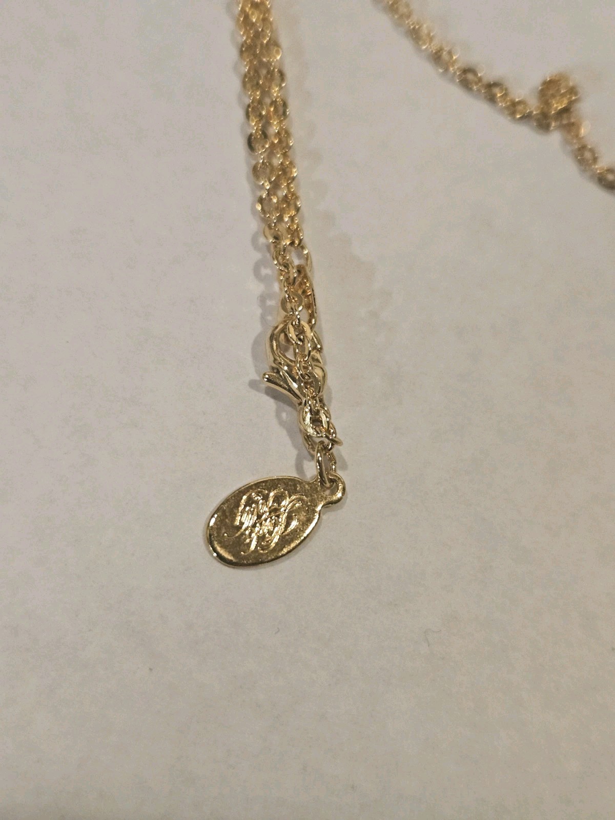 KIRK’S FOLLY Goldtone Necklace Hidden Angel Cherub Heart Pendant Charm 36″