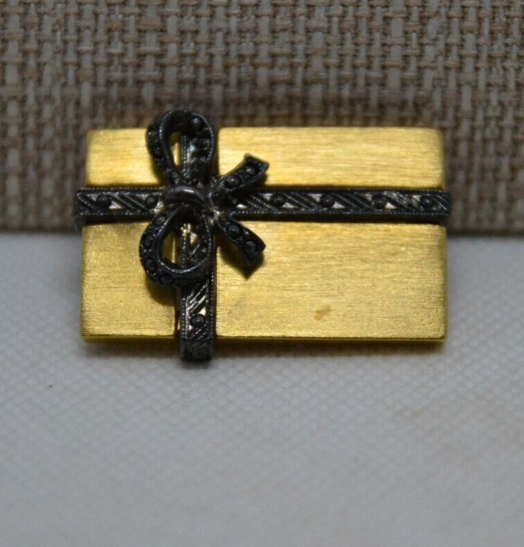 Two tone brooch, package w/ ribbon & bow, marked Darlene, 1.5 in. S3