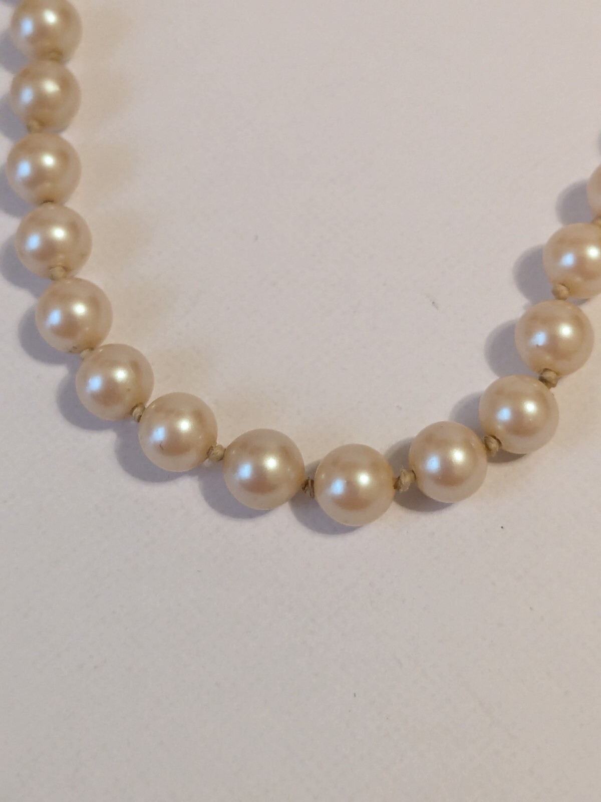 Faux Pearl Vintage Hand Knotted Necklace. Champagne. Barrel Closure 15″.