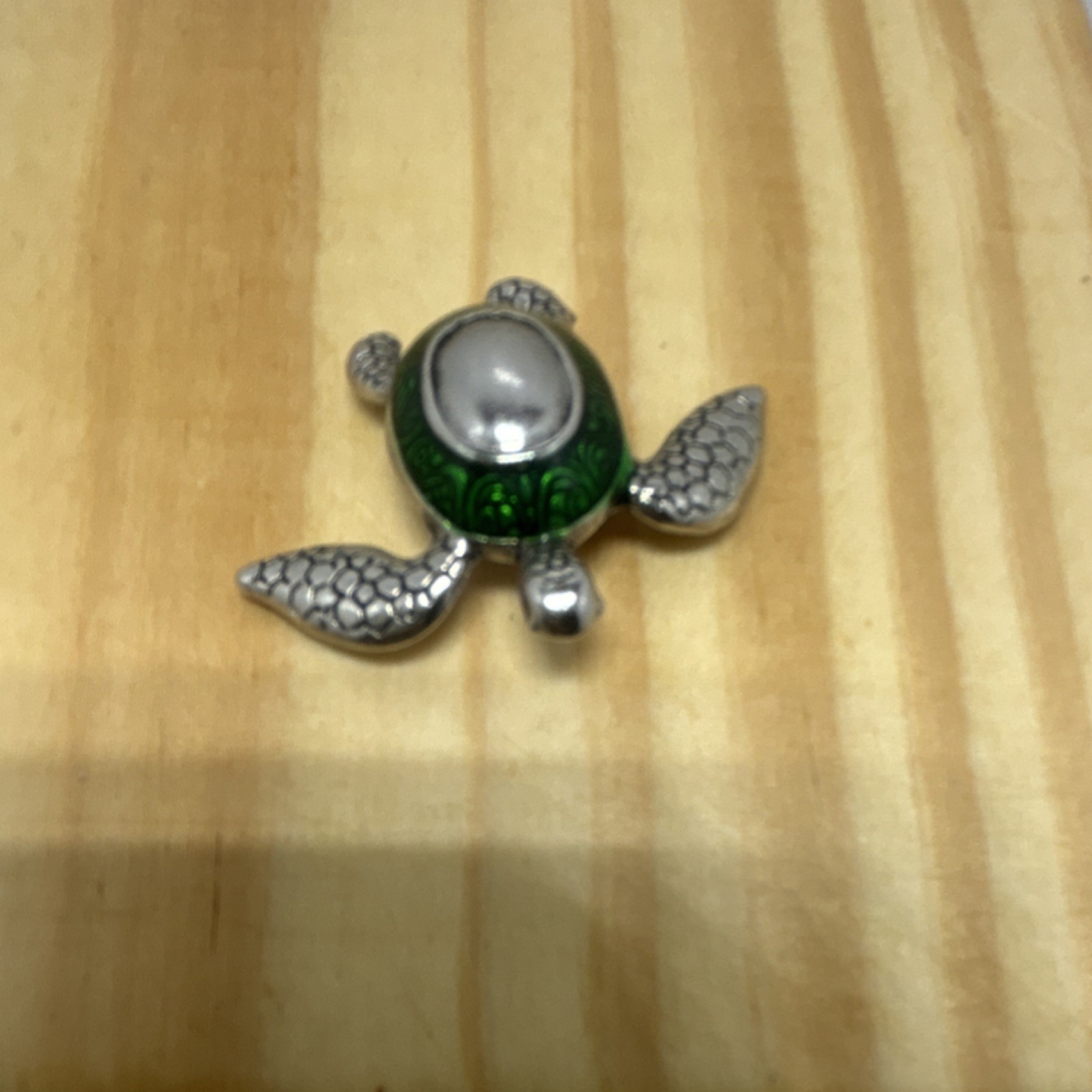 Metal turtle figurine with green and silver shell.(not jewelry)