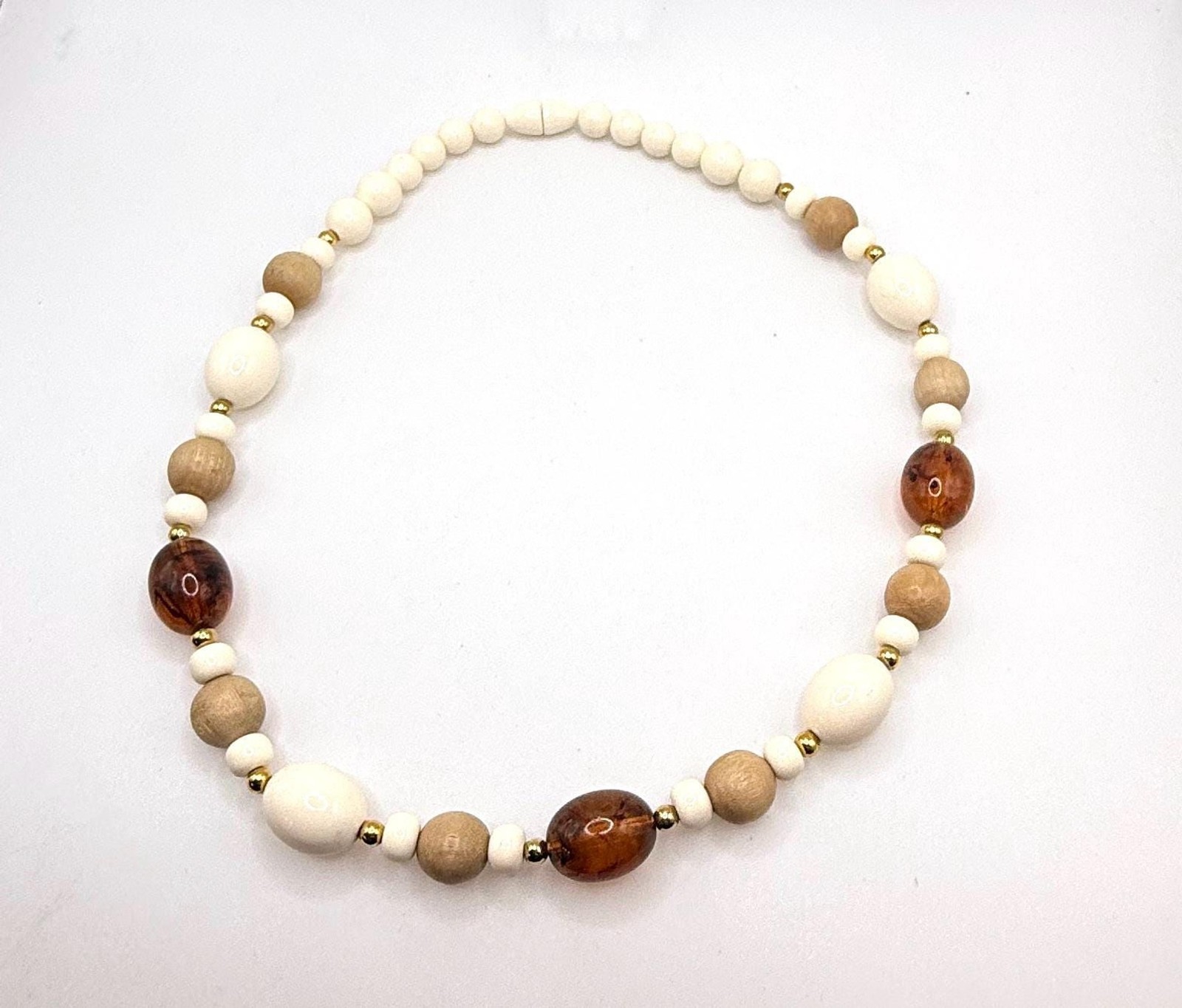 Vintage off white light wood and brown marbled amber colored beaded necklace