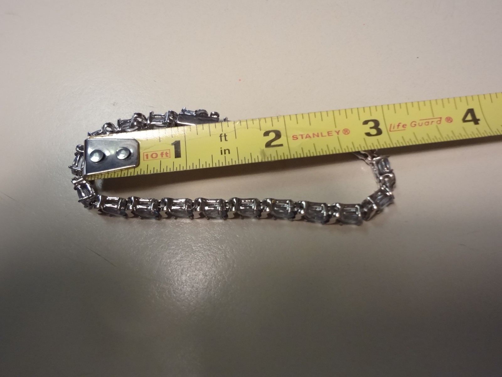 #48-DBJ-925 STERLING SILVER BRACELET LOADED WITH BEAUTIFUL STONES