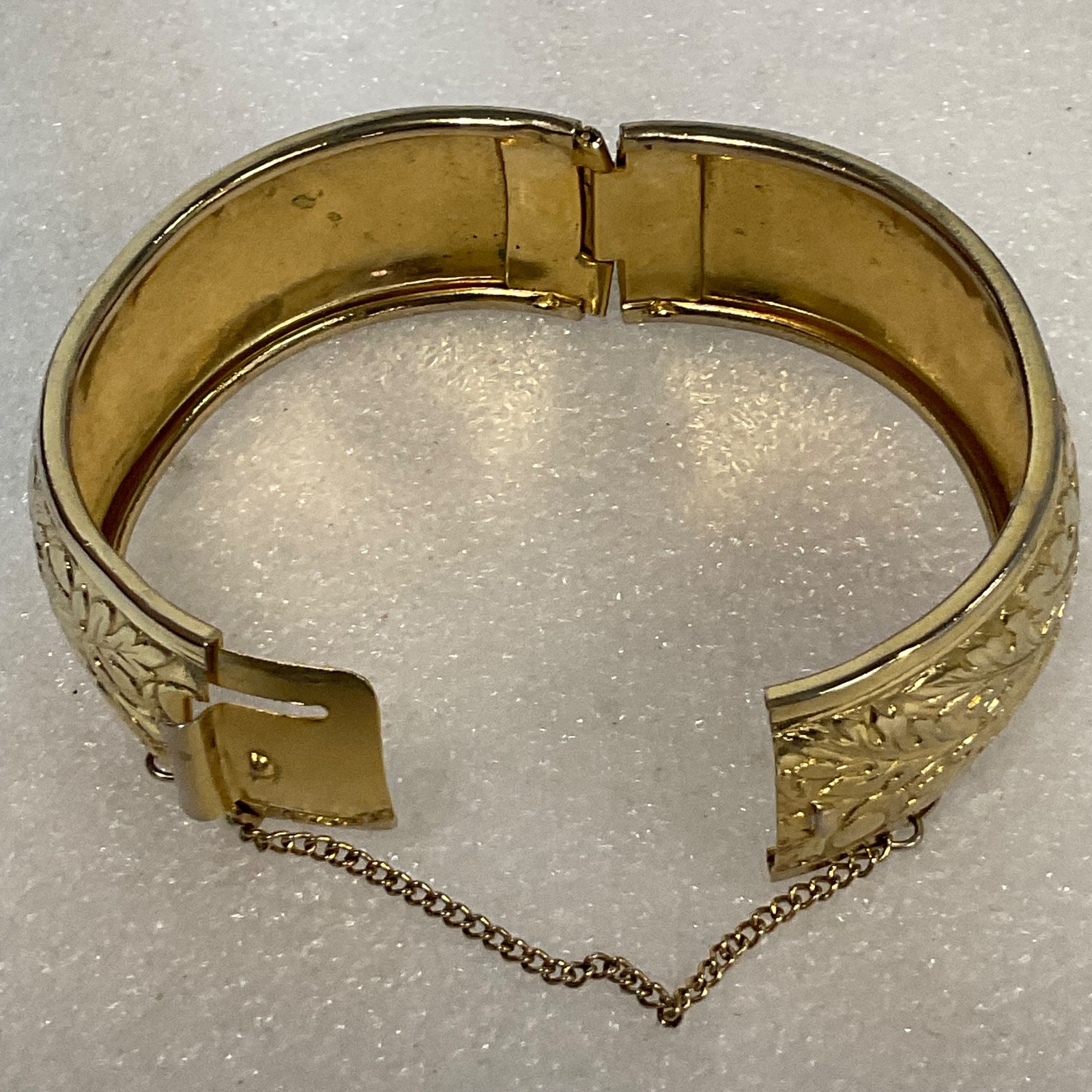 Vintage Coro Gold Tone Hinged Bangle Bracelet 7.25in Floral Engraved SafetyChain