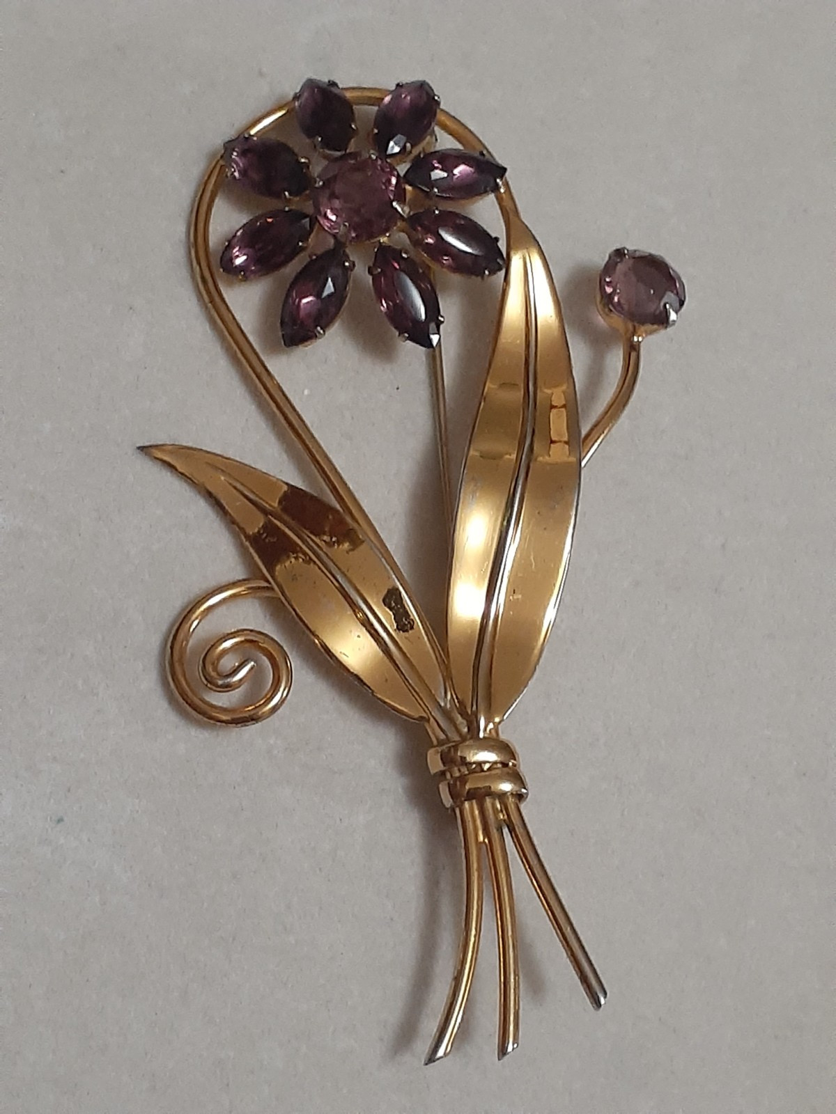 Sterling silver gold plated prong set purple glass flower & stem leaf brooch