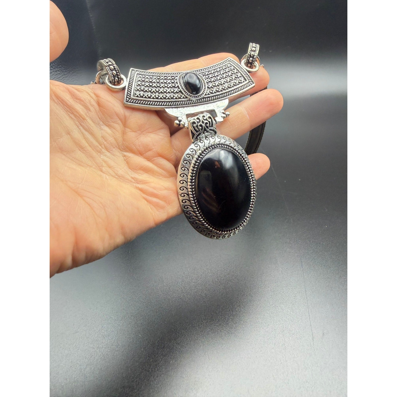 Vintage style silver-tone necklace with black enamel pendant