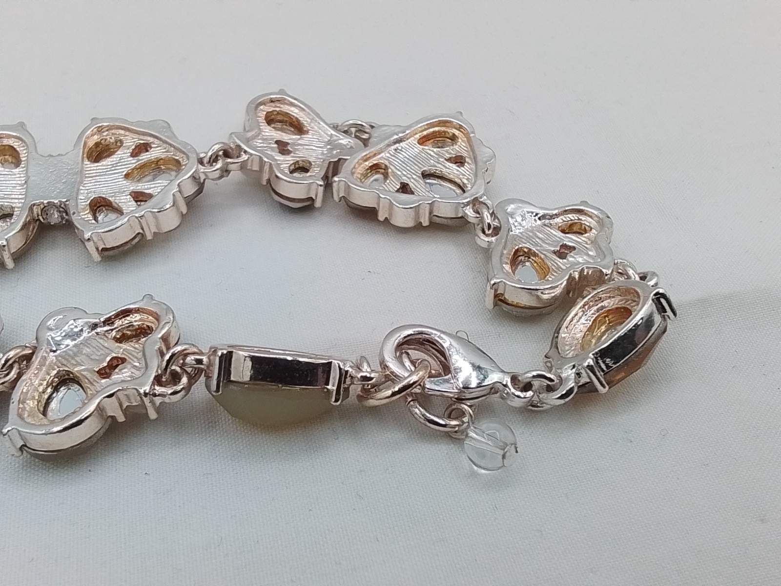 MILKY YELLOW FACETED HONEY-HUED MORPHO BUTTERFLY INSECT MOTIF TENNIS BRACELET