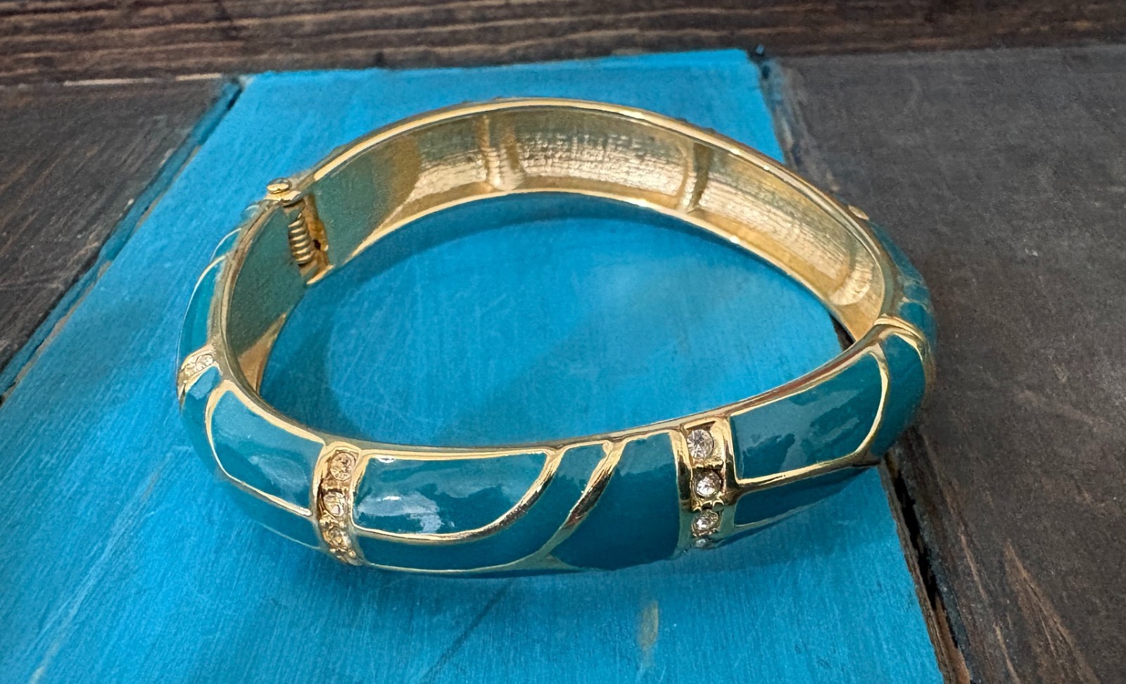 Vintage “Perfect Wave” azure blue enamel and crystal hinged bangle gold tone