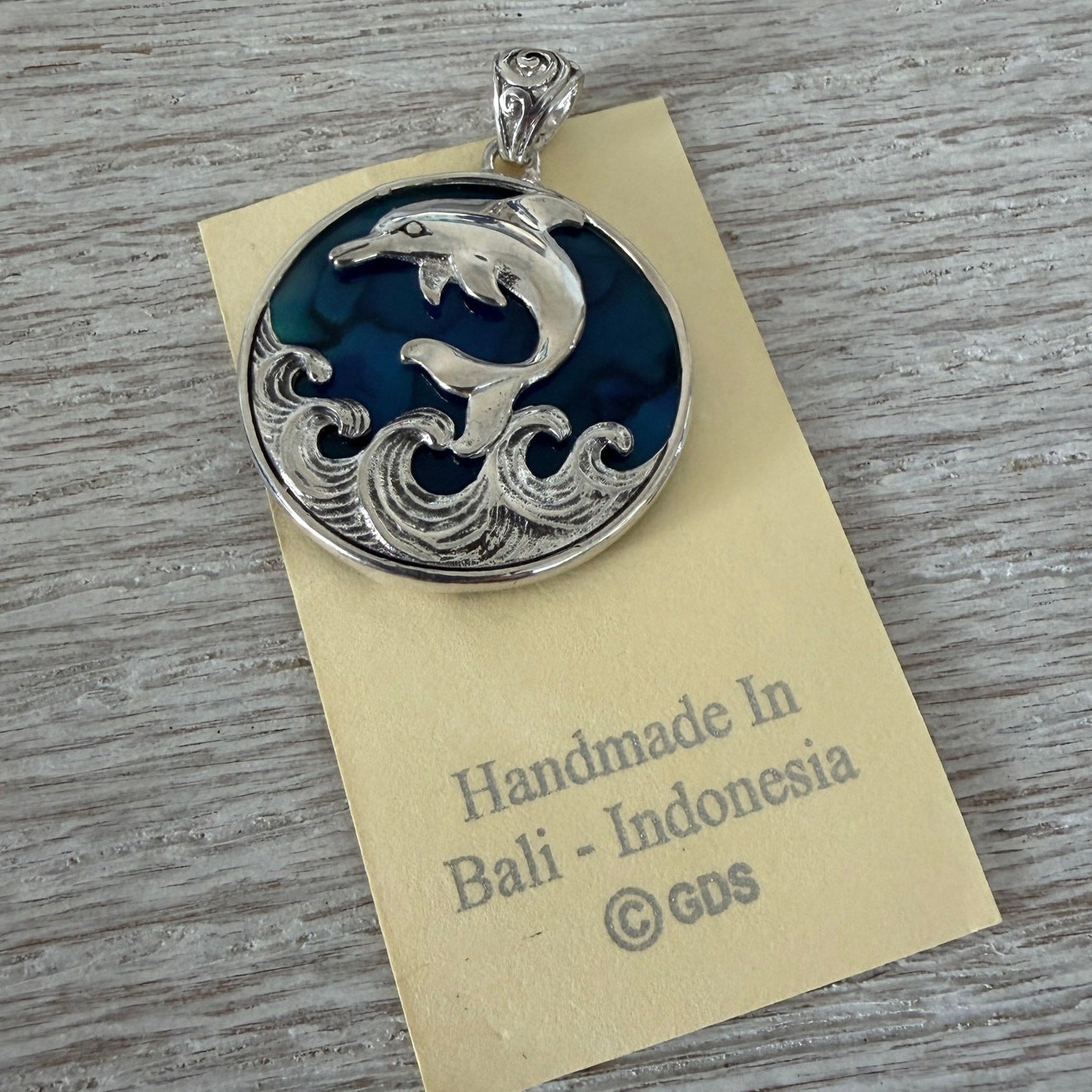 Sterling Silver Dolphin Pendant with Blue Abalone Shell Backing