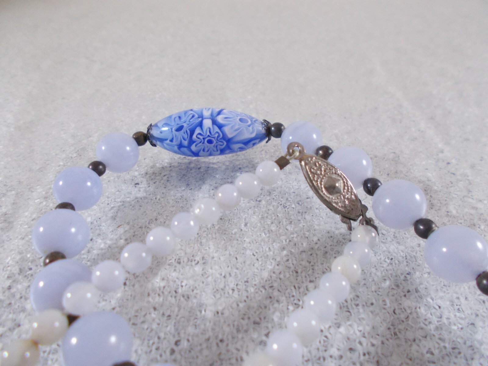Graduated Blue Glass Bead Necklace with Millefiori Bead Accents Fish Hook Clasp