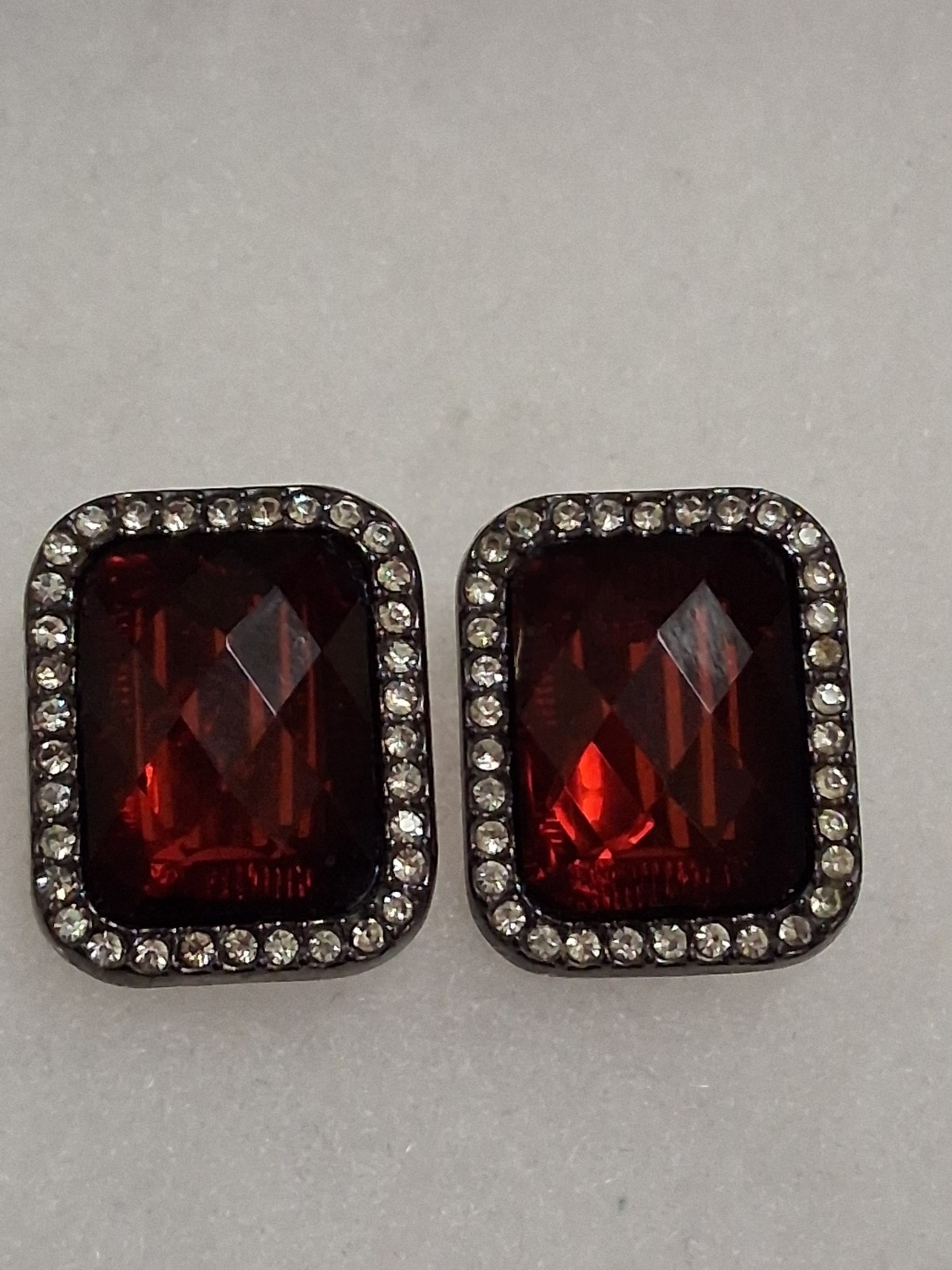 Red faceted acrylic rectangle clip on halo earrings, clear rhinestone border