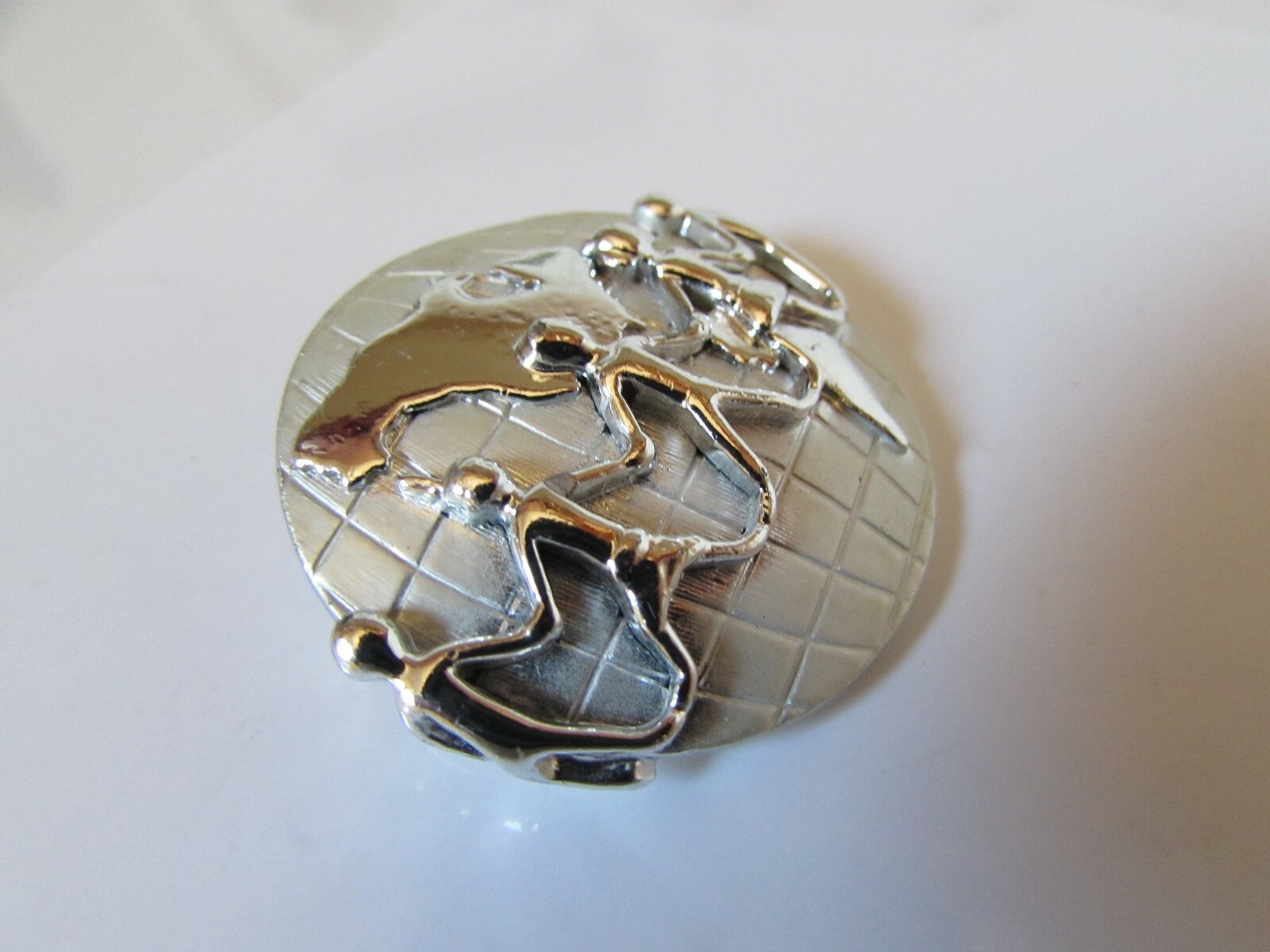 Vintage AJC Signed Silver Tone Holding Hands Across the World Brooch Pin 1 1/2″