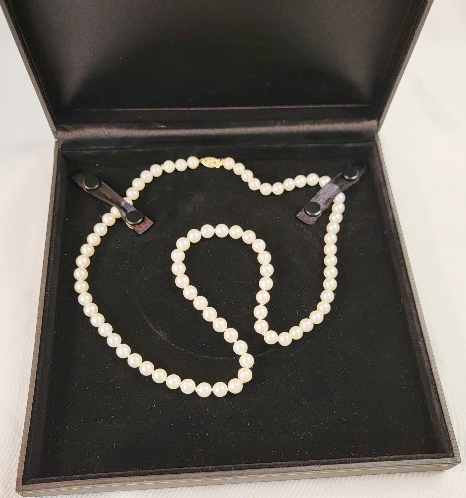 Vintage Pearl Necklace 6.9mm Pearls and 14K Gold Clasp 23.5 in Matinee Length