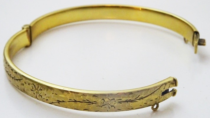 Vintage Hinged 9 karat Gold Bangle with Metal Core