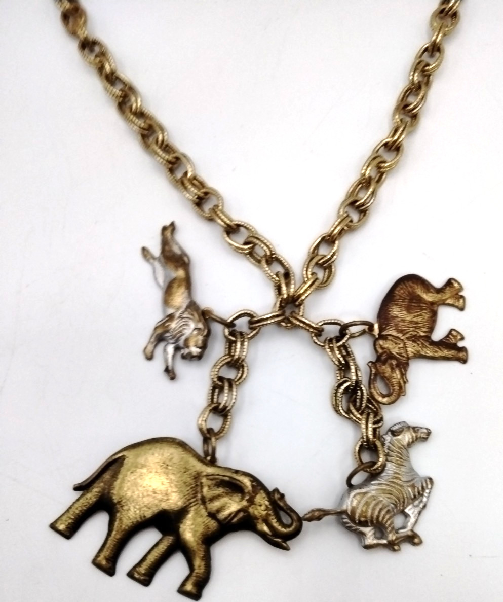 Vintage Gold Tone Safari Animal Charm Necklace Elephant Zebra Lion 18″ Statement