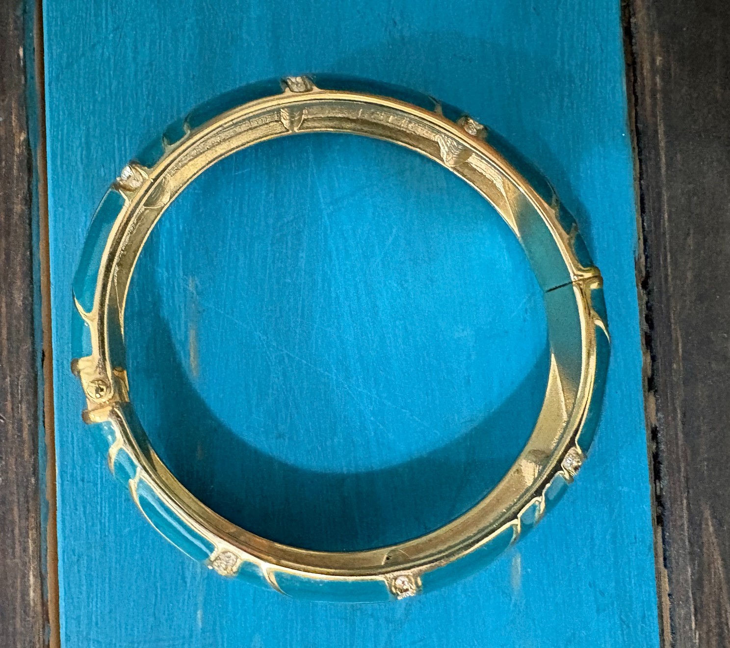 Vintage “Perfect Wave” azure blue enamel and crystal hinged bangle gold tone
