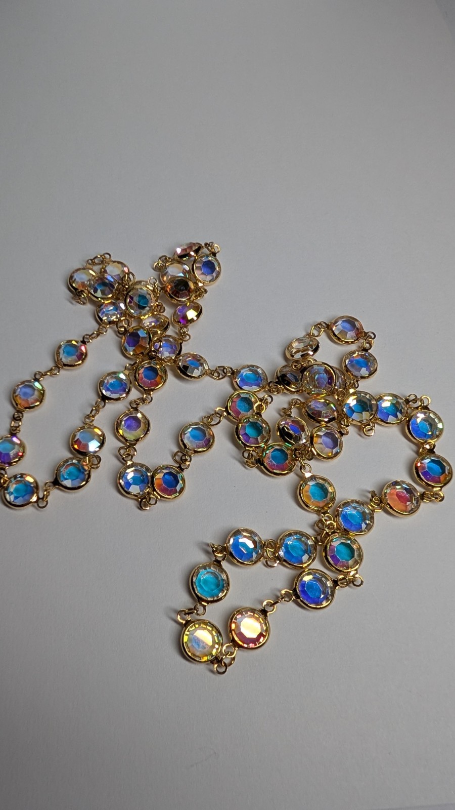 Vintage SWAROVSKI aurora borealis crystal open back bezel set necklace 36″