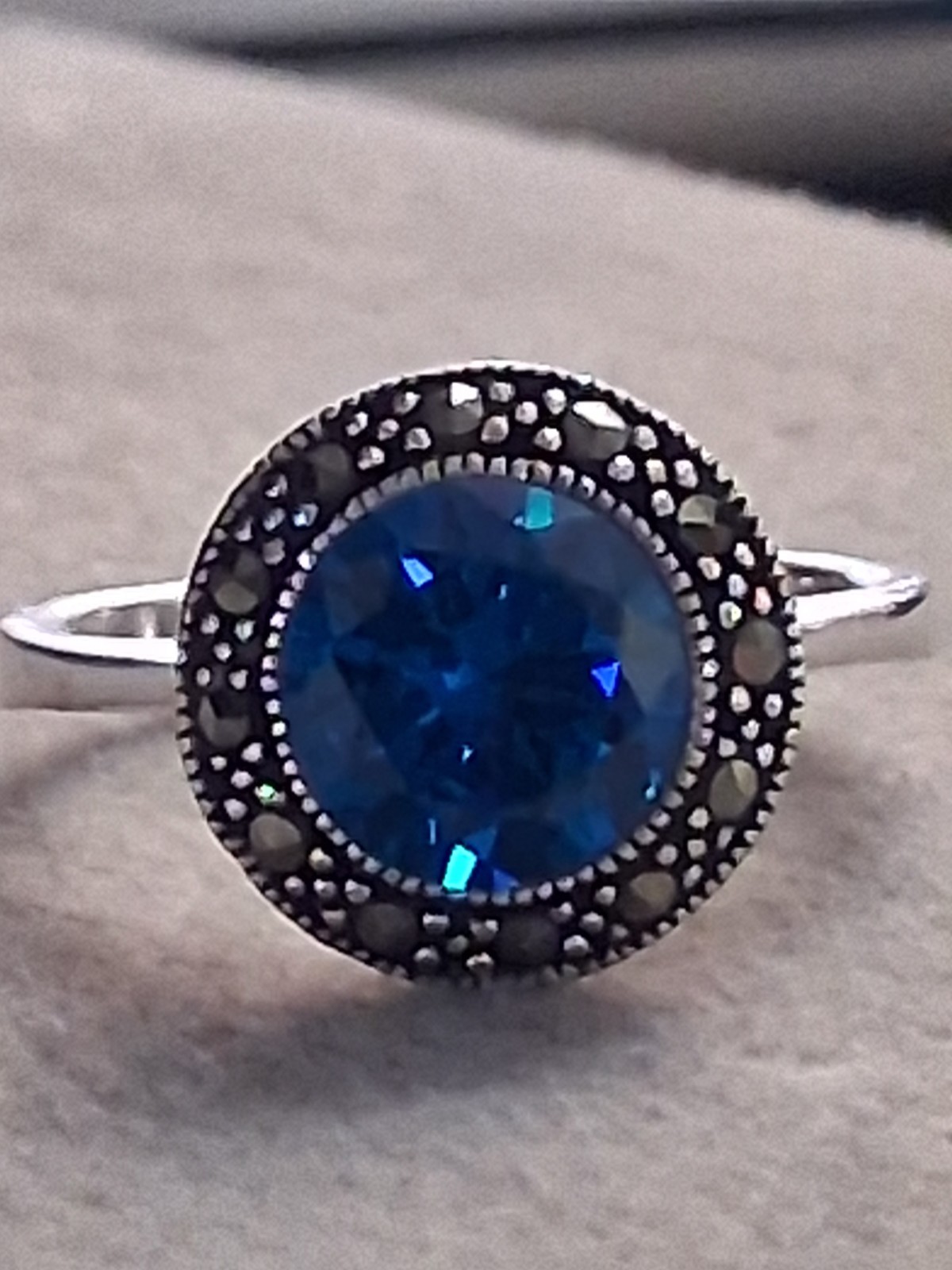 Blue faceted & marcasite halo ring, silverplated, round setting, SZ 6.75