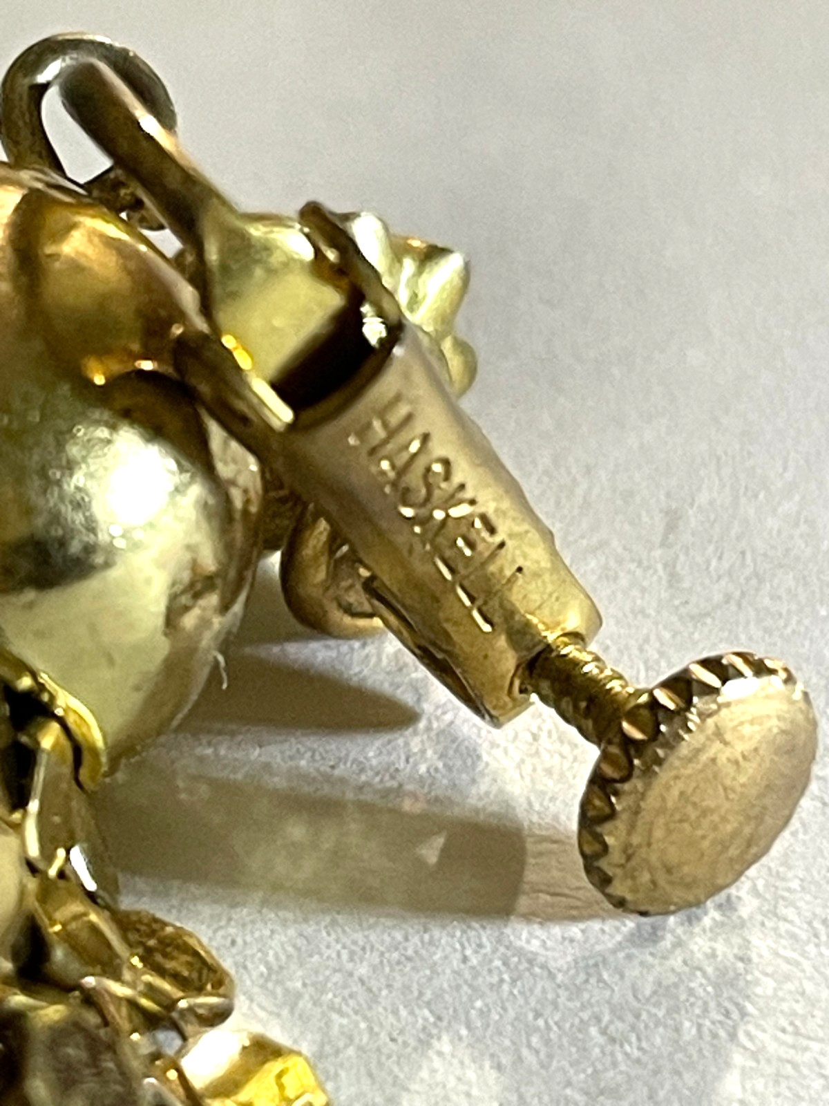 Vintage MIRIAM HASKELL Signed Gold tone Adjustable Clip-on Dangle Earrings.