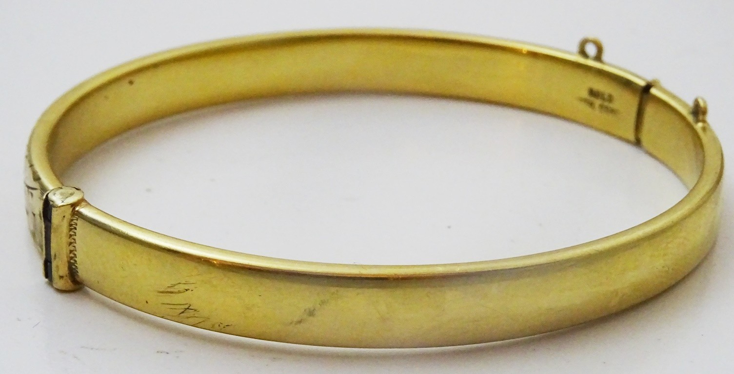 Vintage Hinged 9 karat Gold Bangle with Metal Core