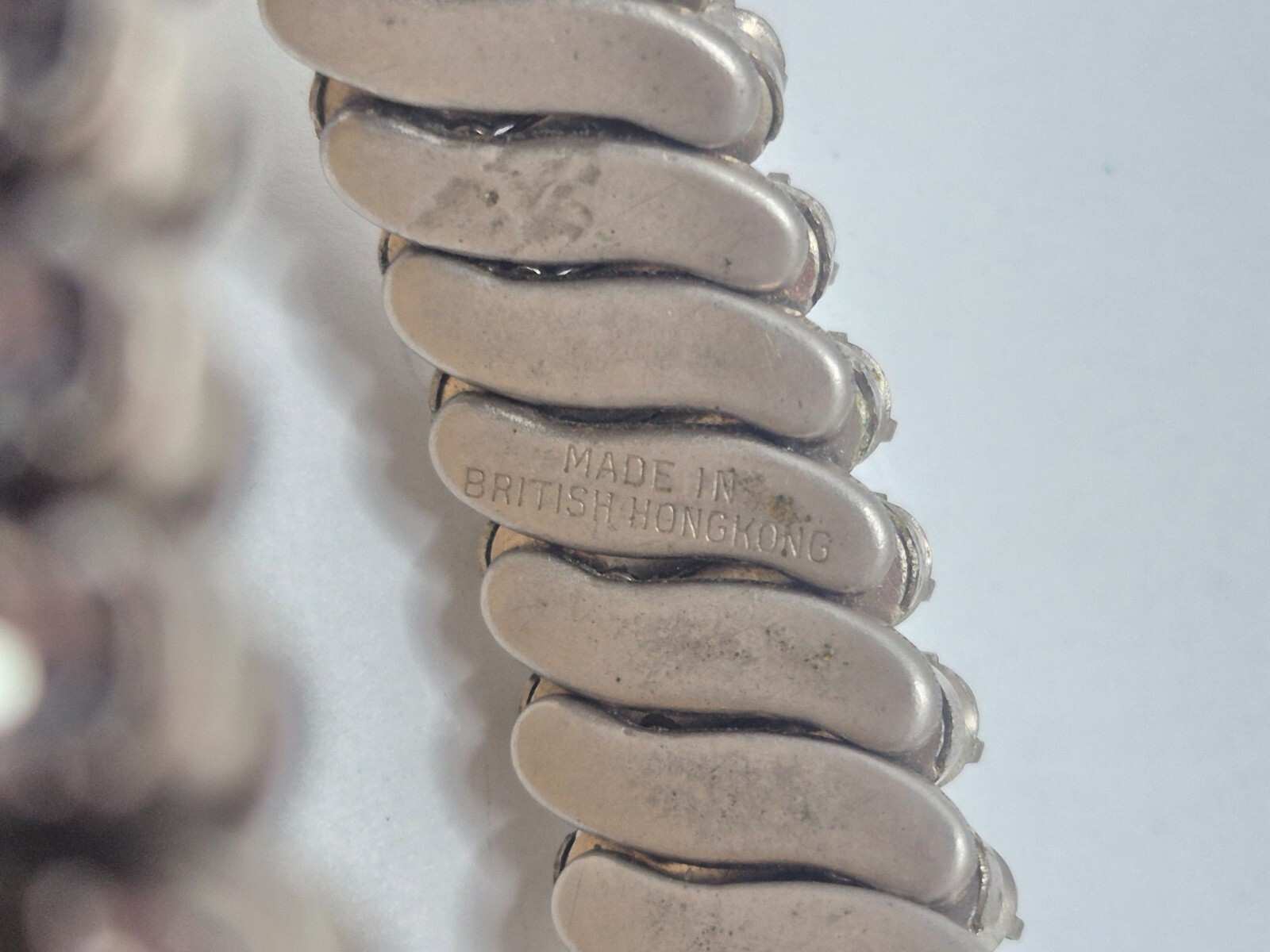 Silver Tone With White Rhinstone Stretch Bracelet “MADE IN BRITISH HONG KONG”