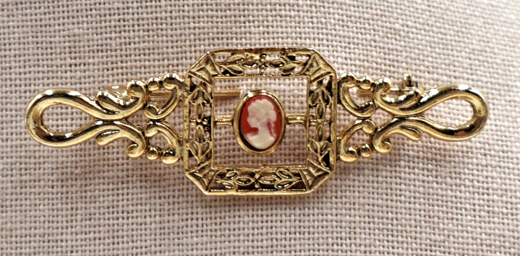 Vintage Tacoa Goldtone Brooch Featuring Fligree Bar with Center Pink Cameo