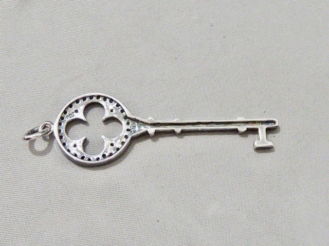 VINTAGE STERLING SILVER CZ KEY CZ PENDANT 5/8″ BY 2″ STERLING SILVER PENDANT