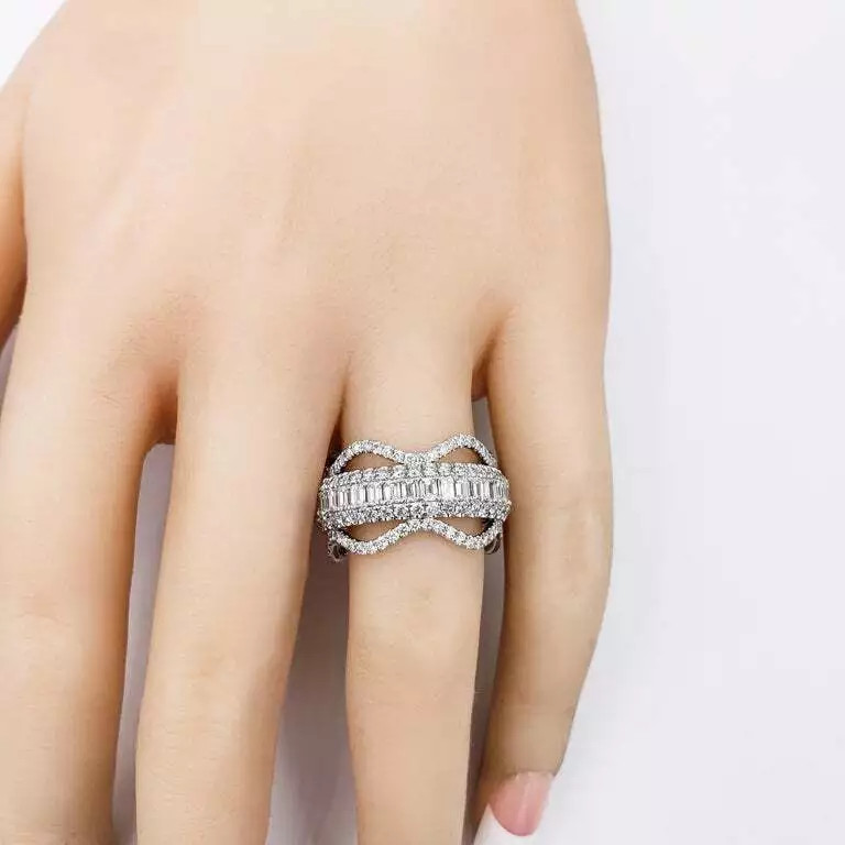 Unique and Gorgeous Piece Showcasing a Row Of Emerald Cut & Round Cut CZ Band