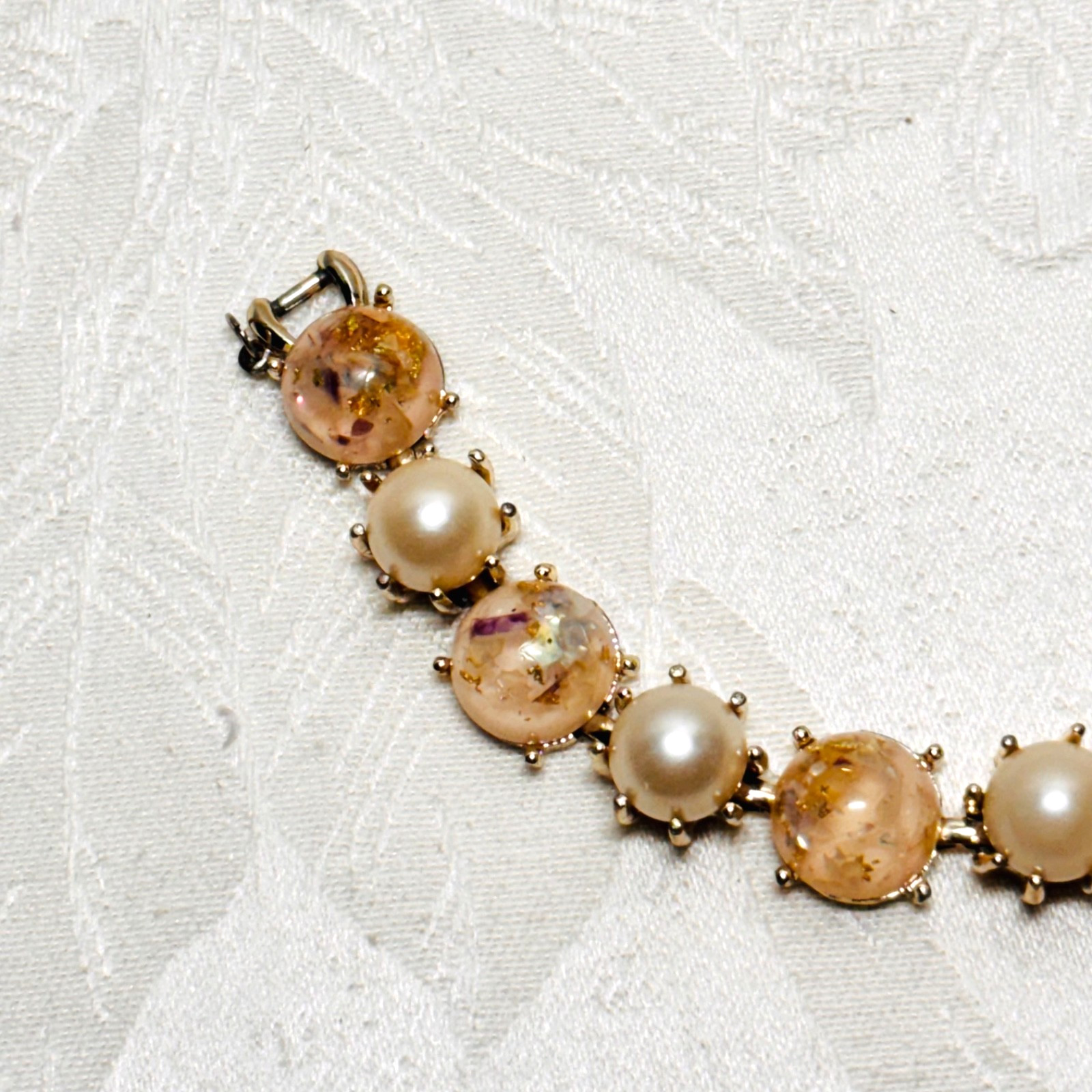 CORO pink confetti Lucite cabochon faux pearl bracelet fold over clasp vintage