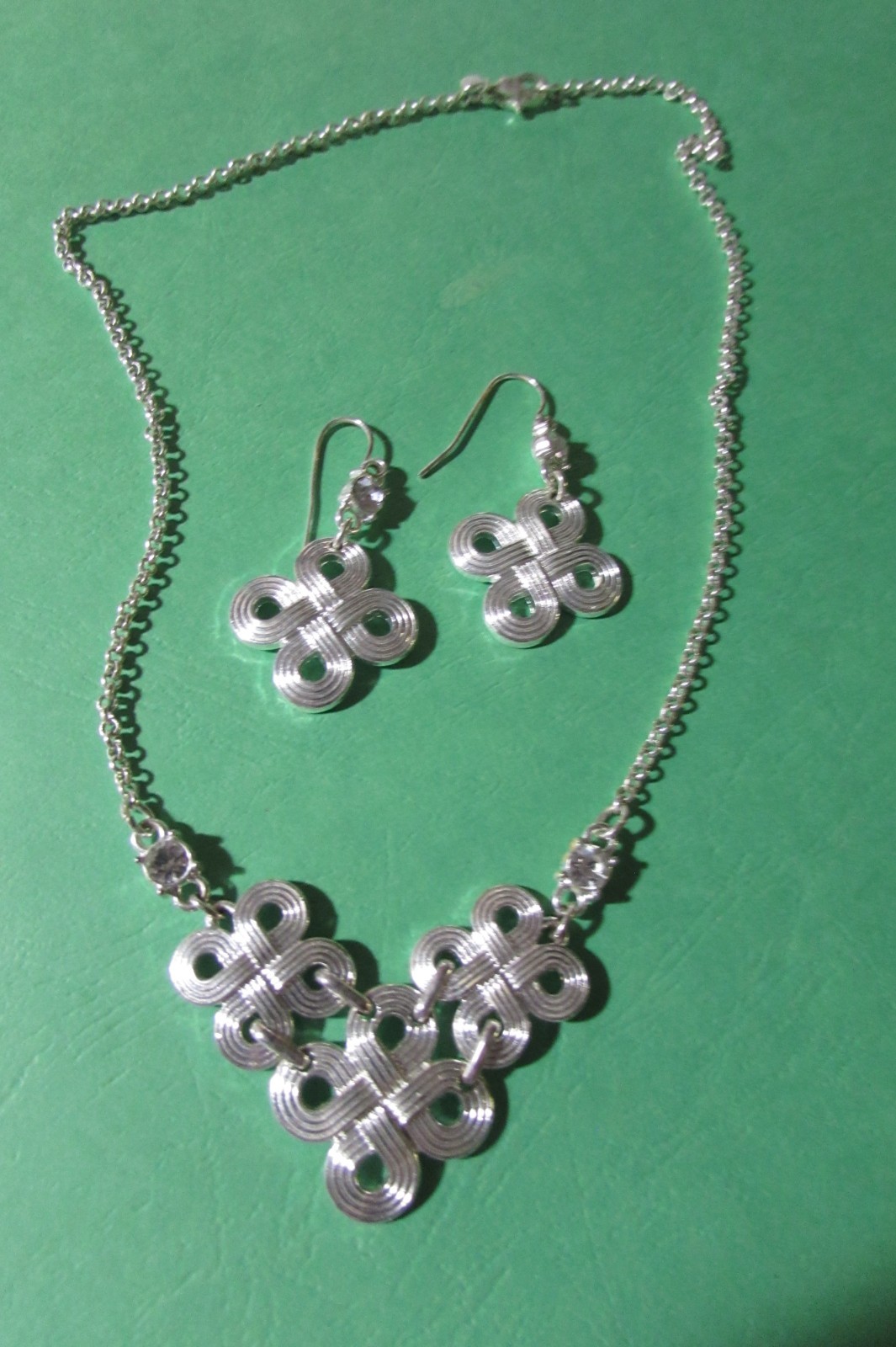 LMN 17″ necklace and almost 2″ pierced earring set silvertone swirl w/rhinestone