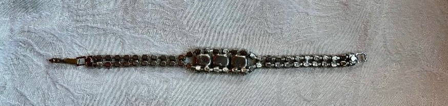 Vintage rhinestone bracelet, small clear stones,gold & black center settings