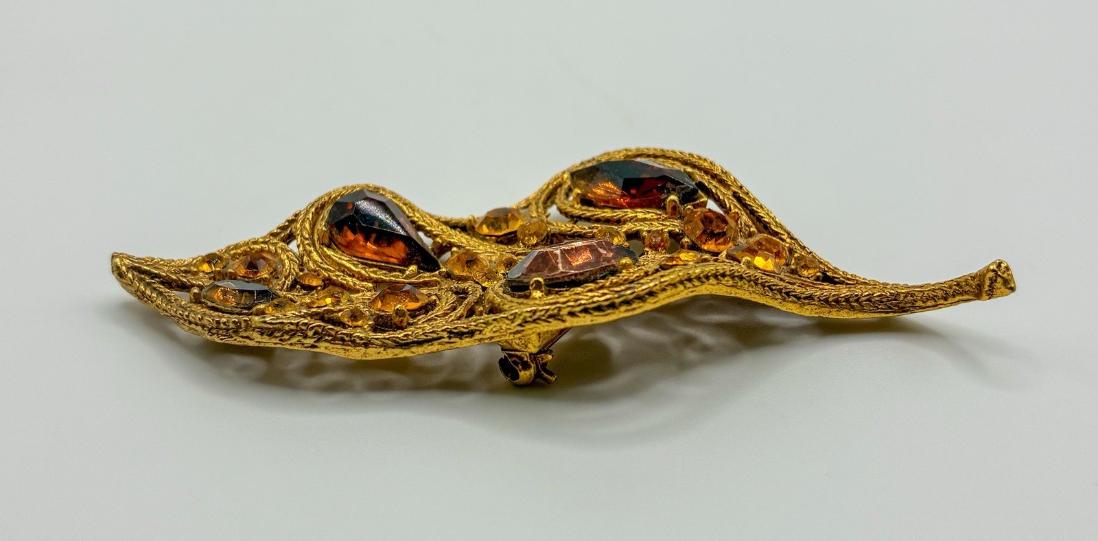 La Roco 1950s Texture Gold Plate Shades of Topaz Rhinestone Leaf Brooch