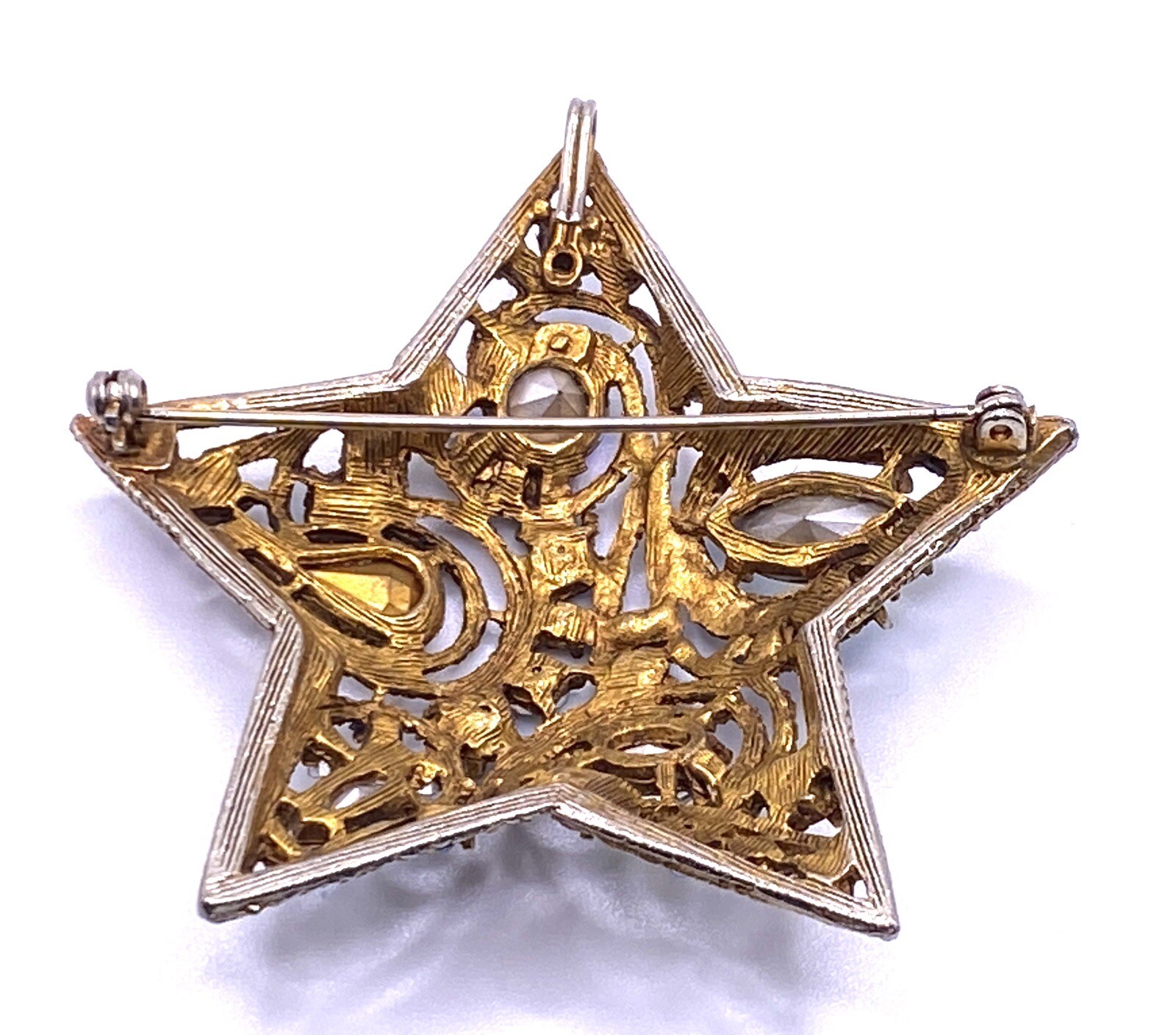 La Roco 1950s Star Brooch Colorful Gold Tone Rhinestones Textured Gold Plate