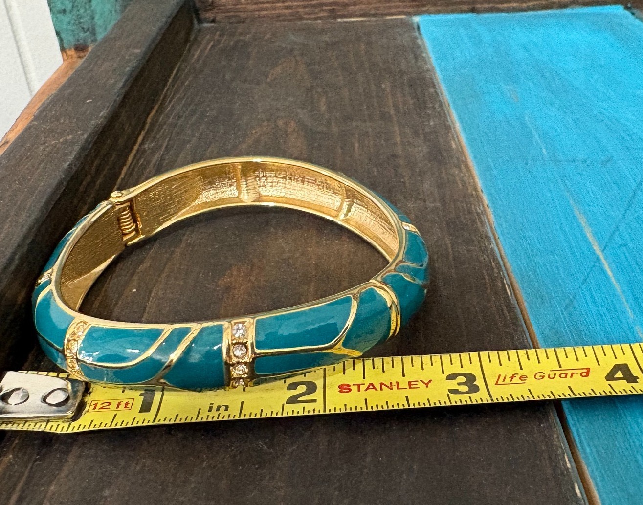 Vintage “Perfect Wave” azure blue enamel and crystal hinged bangle gold tone