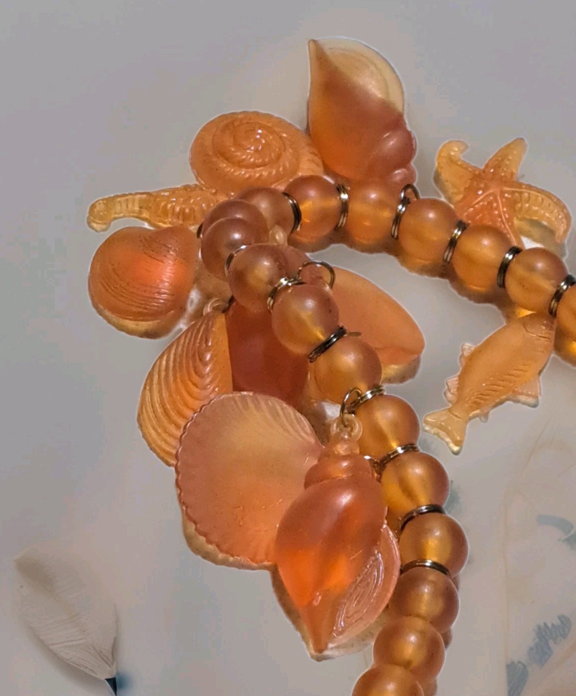 Vtg Lucite Acrylic Retro Glowing Amber Unique Beaded Necklace Shell Fish Charms