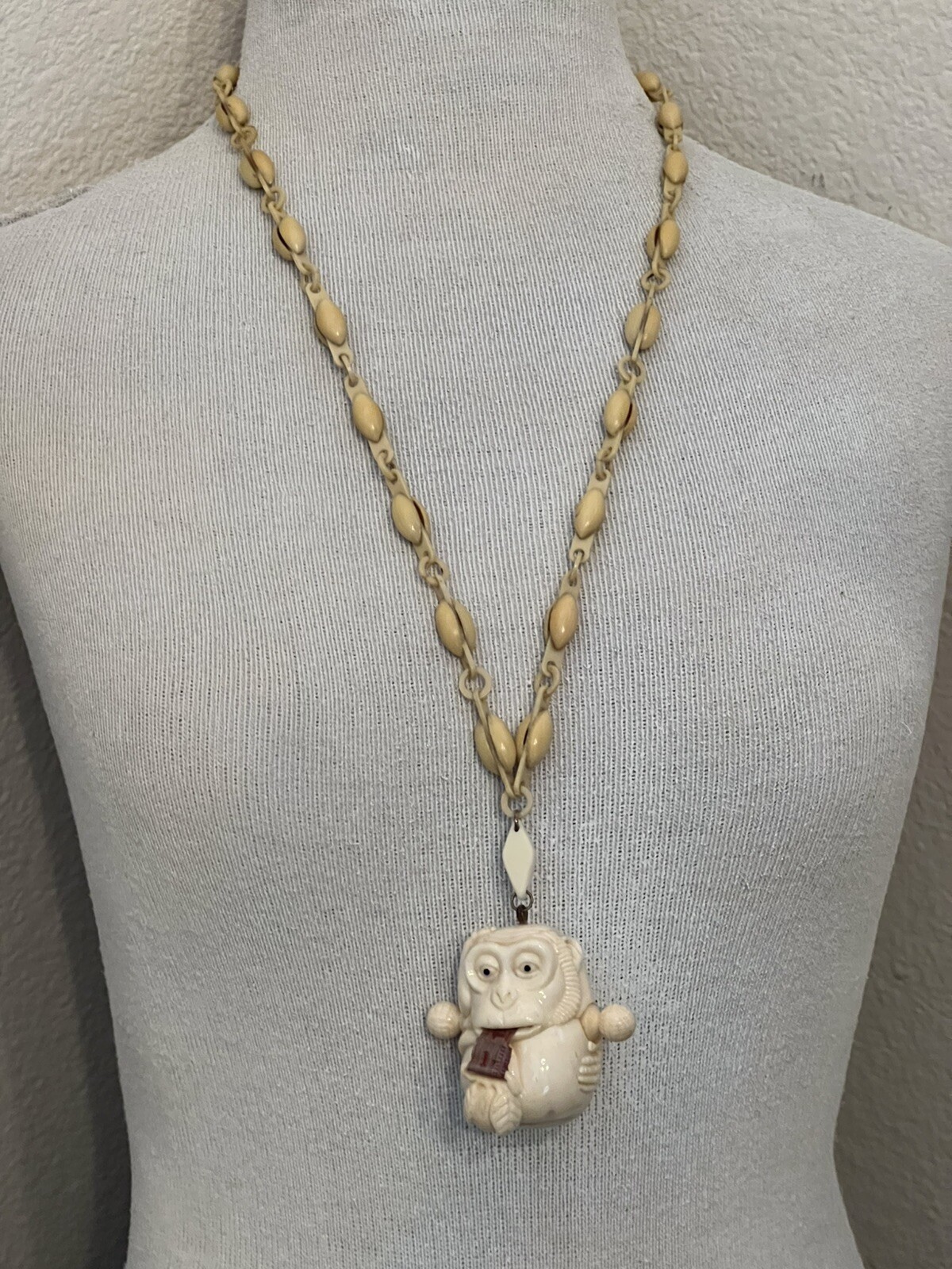 ANTIQUE ART DECO MONKEY NECKLACE TAPE MEASURE CELLULOID CHAIN PENDANT WHIMSICAL
