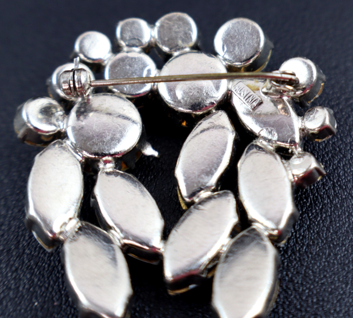 vintage Austria clear rhinestone brooch pin silver tone faceted crystals prongs