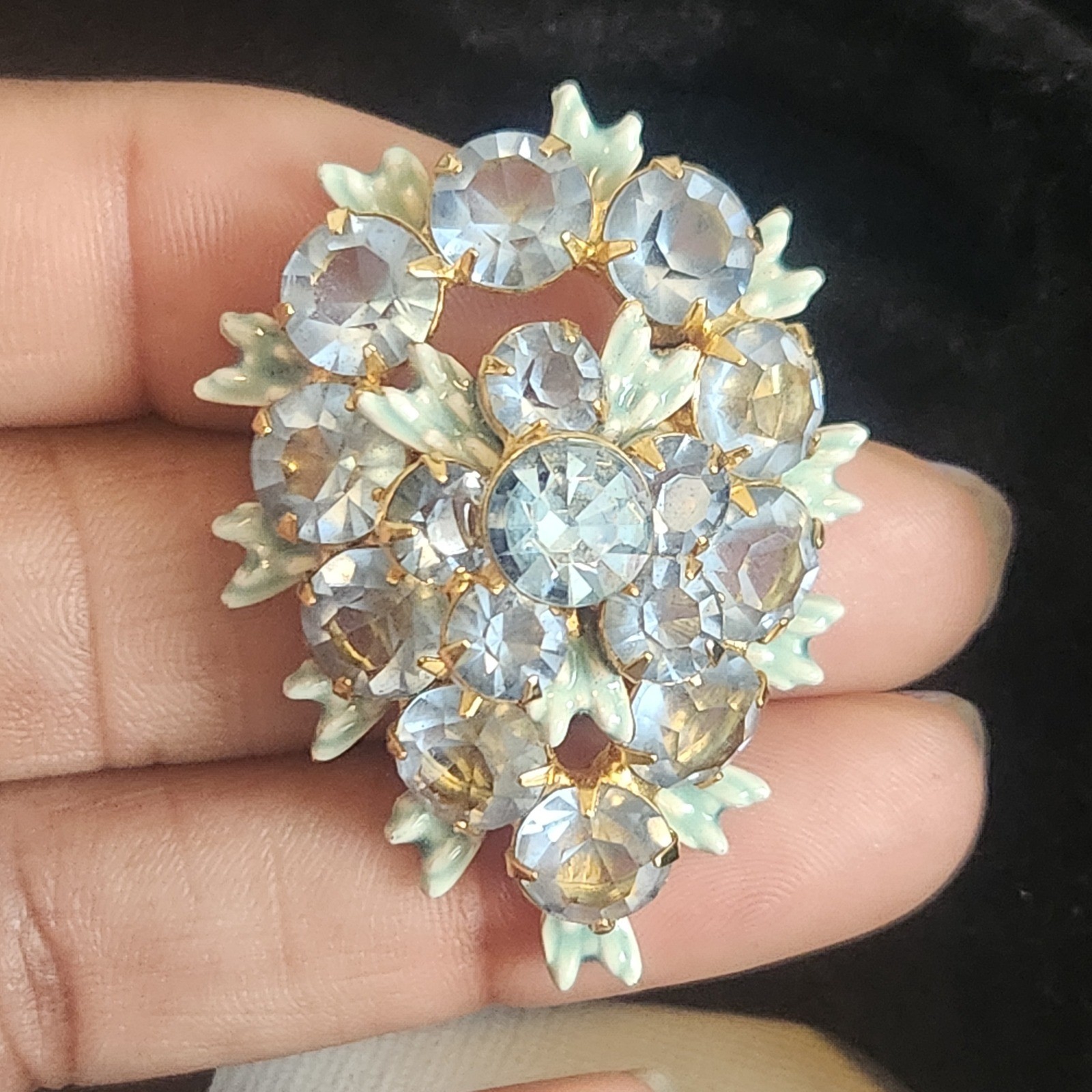 Vintage Light Blue Rhinestone Floral Cluster brooch Gold Tone Enamel Leaf Detail
