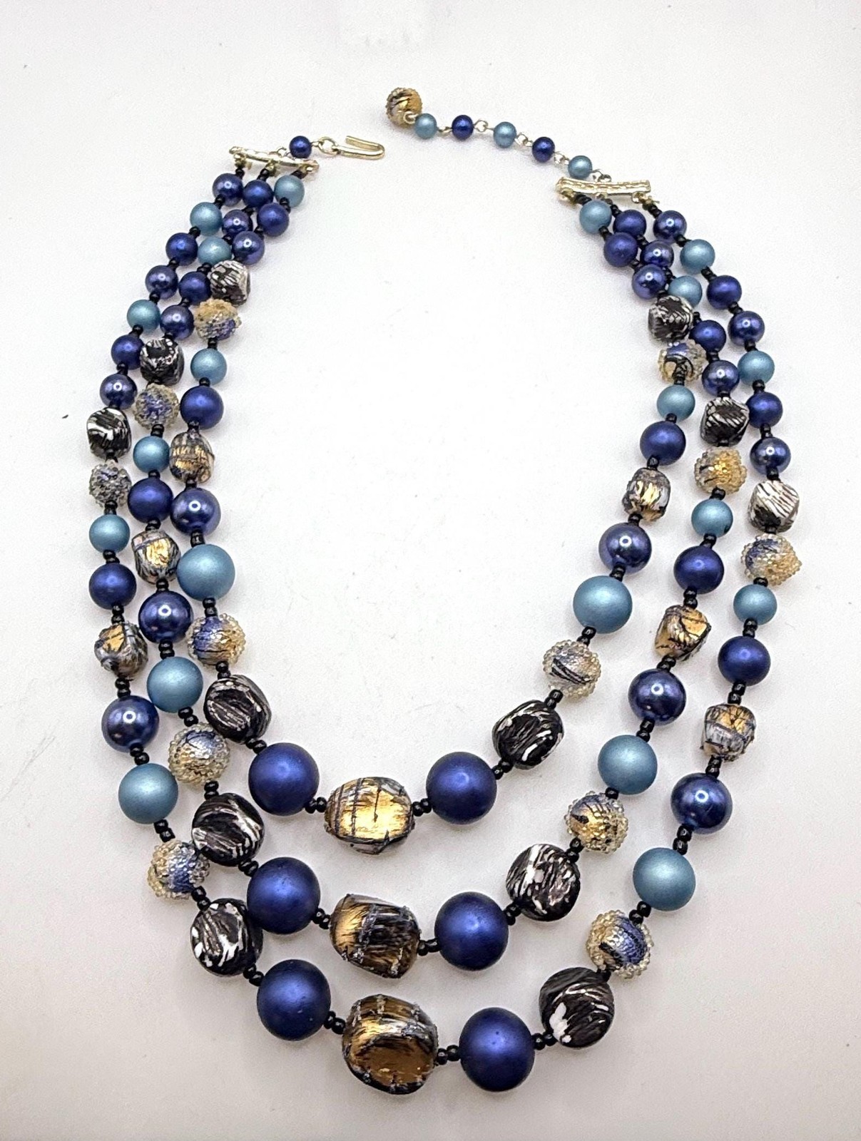 Vintage blue and gold two strand necklace and clip on earring set
